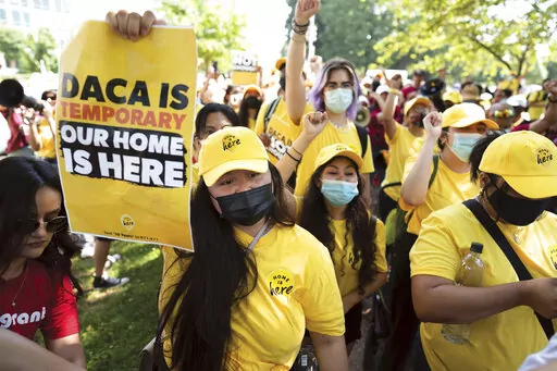 Susana Lujano, left, a dreamer from Mexico who lives in Houston, joins other activists to rally in support of the Deferred Action for Childhood Arrivals program, also known as DACA, at the U.S. Capitol in Washington on June 15, 2022. The fate of DACA, a program preventing the deportation of hundreds of thousands of immigrants brought into the United States as children, was set Friday, Oct. 14, 2022, to again be in front of a federal judge who has previously declared it illegal. (AP Photo/J. Scot