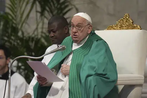Pope Francis delivers his speech during a mass on the occasion of the World Day of the Poor in St. Peter's Basilica, at the Vatican, Sunday, Nov. 17, 2024. (AP Photo/Alessandra Tarantino)