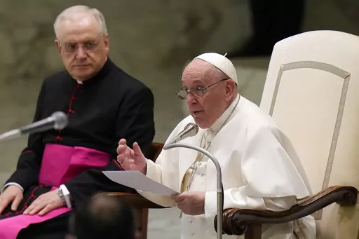 Pope Francis delivers his speech during his weekly general audience in the Paul VI Hall, at the Vatican, Wednesday, Jan. 5, 2022. (AP Photo/Alessandra Tarantino)