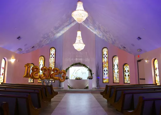 Decorations adorn The Wedding Chapel at Vegas Weddings on Tuesday, Dec. 19, 2023, in Las Vegas. The Las Vegas Review-Journal reports that New Year’s Eve could take the cake for the busiest wedding day in Las Vegas thanks to the date's repeating pattern of 1-2-3-1-2-3. That's known as a specialty date for those who work in the massive Las Vegas wedding industry. (Bizuayehu Tesfaye/Las Vegas Review-Journal via AP)