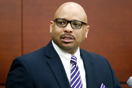 FILE- Alfred Rankins Jr., a state higher education administrator, speaks during a news conference on Feb. 27, 2014, in Jackson, Miss. Rankins, Jr., Mississippi’s commissioner of higher education, said nursing programs have struggled to retain faculty members because of the state's lower than average salaries for public university employees. (AP Photo/Rogelio V. Solis)