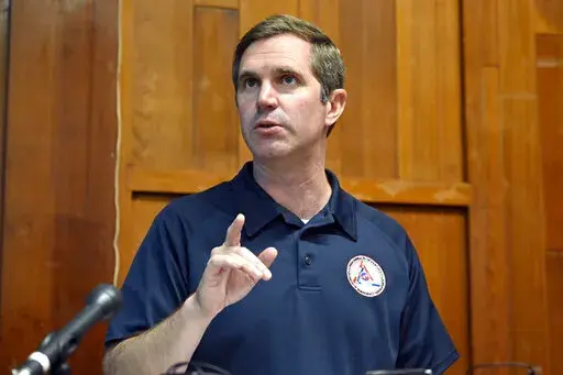 Kentucky Governor Andy Beshear addresses Floyd county officials and flood victims in Prestonsburg, Ky., Tuesday, Sept. 6, 2022. Despite being a Democratic Governor in a Republican dominated state, Beshear has a large amount of support from Kentucky residents. (AP Photo/Timothy D. Easley)