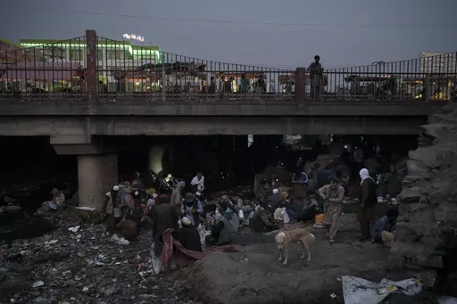 Afghans gather under a bridge to consume drugs, mostly heroin and methamphetamines in Kabul, Afghanistan, on Sept. 30, 2021. Afghanistan is the world’s fastest-growing maker of methamphetamine, a report from the United Nations drug agency said Sunday, Sept. 10, 2023. The country is also a major opium producer and heroin source, even though the Taliban declared a war on narcotics after they returned to power in August 2021.(AP Photo/Felipe Dana, File)