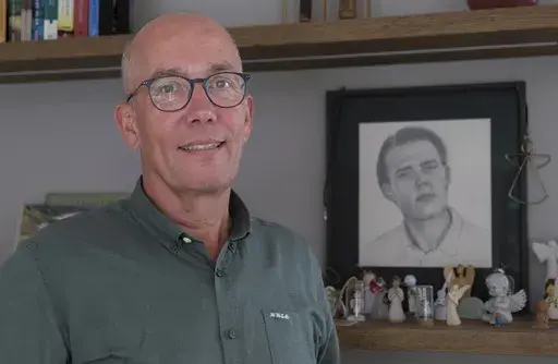 Thomas Schansman poses in front of a drawing of his son, Quinn, at his home in the central Dutch city of Hilversum, Netherlands, Thursday, July 11, 2024. Quinn Schansman dreamed of becoming the youngest ever CEO of an American company. But the 18-year-old dual Dutch-American citizen's future — whatever it may have held — was cruelly cut short when he was one of the 298 people killed as a Soviet-era Buk surface-to-air rocket launched from territory in eastern Ukraine controlled by pro-Russian
