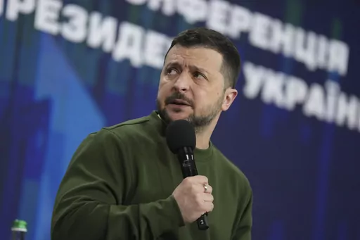 Ukrainian President Volodymyr Zelenskyy answers media questions during his press conference in Kyiv, Ukraine, Sunday Feb. 25, 2024. (AP Photo/Evgeniy Maloletka)