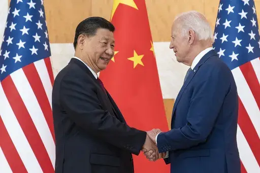 U.S. President Joe Biden, right, and Chinese President Xi Jinping shake hands before a meeting on the sidelines of the G20 summit meeting on Nov. 14, 2022, in Bali, Indonesia. Biden and Xi will hold a long-anticipated meeting Wednesday in the San Francisco Bay area. That's according to two senior Biden administration officials. (AP Photo/Alex Brandon, File)