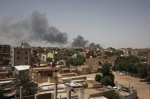 Smoke rises in Khartoum, Sudan, on April 22, 2023. In the country's capital, Sudan's army and the paramilitary group known as the Rapid Support Forces have battled in the streets with automatic rifles, artillery and airstrikes. An AP journalist, waiting for a chance to leave the country, sheltered with a diverse group of more than a dozen people who hunkered down in a small hotel in central Khartoum. (AP Photo/Marwan Ali, File)