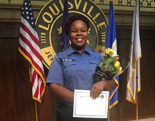 This undated file photo provided by Taylor family attorney Sam Aguiar shows Breonna Taylor in Louisville, Ky. Taylor, a 26-year-old Black woman, was fatally shot by police in her Louisville, Ky., apartment in March 2020. A former Louisville police detective who helped write the warrant that led to the deadly police raid at Taylor's apartment has pleaded guilty to a federal conspiracy charge. (Courtesy of Taylor Family attorney Sam Aguiar via AP, File)