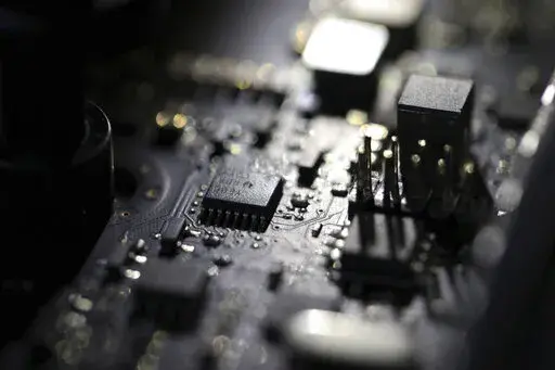 This Feb 23, 2019, photo shows the inside of a computer. A key part of President Joe Biden's plans to fight major ransomware attacks and digital espionage campaigns has been languishing for more than eight months.(AP Photo/Jenny Kane, File)