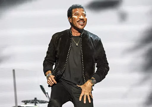 Lionel Richie performs at KAABOO Texas in Arlington, Texas on May 10, 2019. The Library of Congress said Thursday that Richie will receive the national library’s Gershwin Prize for Popular Song. He will be bestowed the prize at an all-star tribute in Washington, D.C., on March 9. (Photo by Amy Harris/Invision/AP, File)