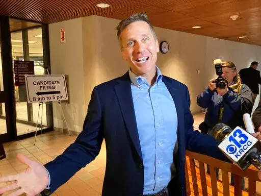 Former Missouri Gov. Eric Greitens gestures while speaking to reporters in Jefferson City Feb. 22, 2022. Greitens resigned as Missouri governor amid criminal charges and legislative investigations, is accused of abuse and bullying by his ex-wife and ran a widely condemned ad suggesting he was hunting members of his own party with a gun. And the Republican is still a leading contender for election to the U.S. Senate. (AP Photo/David A. Lieb File)