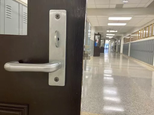 The hallway is empty at Baton Rouge Magnet High School on Jan. 30, 2023 in Baton Rouge, La. America’s Black and Latino students are at a disadvantage in nearly every measure of educational opportunity, with less access to advanced classes, counselors and even certified teachers, according to data released Wednesday, Nov. 15, by the U.S. Education Department. (AP Photo/Stephen Smith, file)