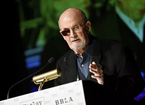 Author Salman Rushdie receives the Vaclav Havel Library Foundation's first ever lifetime achievement disturbing the peace award at the Vaclav Havel Center on Tuesday, Nov. 14, 2023, in New York. Rushdie's first book since the 2022 stabbing he thought might end his life is both explicit in the violence Rushdie sustains and heroic in the will to live that Rushdie retains. (Photo by Evan Agostini/Invision/AP, File)