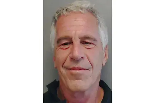 This image provided by the Florida Department of Law Enforcement shows financier Jeffrey Epstein, on July 25, 2013. A statement released on Sunday, Jan 1, 2023, by the governor of the U.S. Virgin Islands, relieved of her duties the attorney general who pursued various cases against disgraced financier Jeffrey Epstein, including a lengthy legal fight that resulted in a $105 million settlement. (Florida Department of Law Enforcement via AP File)