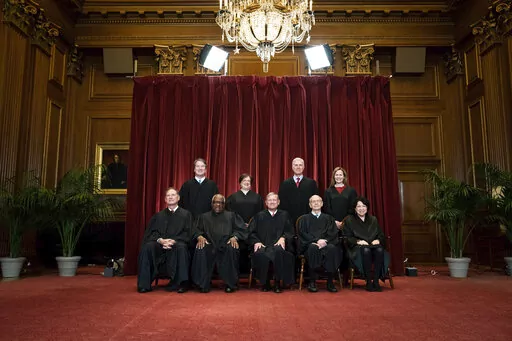 Members of the Supreme Court pose for a group photo at the Supreme Court in Washington, April 23, 2021. Seated from left are Associate Justice Samuel Alito, Associate Justice Clarence Thomas, Chief Justice John Roberts, Associate Justice Stephen Breyer and Associate Justice Sonia Sotomayor, Standing from left are Associate Justice Brett Kavanaugh, Associate Justice Elena Kagan, Associate Justice Neil Gorsuch and Associate Justice Amy Coney Barrett. Judge Ketanji Brown Jackson will join a Supreme
