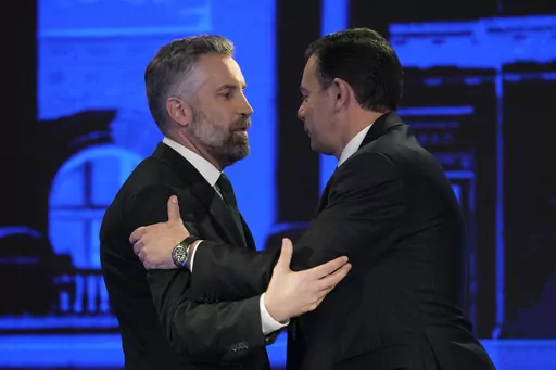 Socialist Party leader Pedro Nuno Santos, left, and Luis Montenegro, leader of the Social Democratic Party, greet each other before an election TV debate in Lisbon, Portugal, Feb. 19, 2024. The center-left Socialist Party and center-right Social Democratic Party have alternated in power for decades. But they are unsure of how much support they might need from smaller rival parties to form a government after the March 10 vote. (AP Photo/Armando Franca, File)