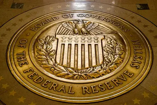FILE- In this Feb. 5, 2018, file photo, the seal of the Board of Governors of the United States Federal Reserve System is displayed in the ground at the Marriner S. Eccles Federal Reserve Board Building in Washington.Richmond Federal Reserve President Thomas Barkin on Friday, Feb. 17, 2023 downplayed recent signs that the economy is strengthening, but also said he is prepared to keep raising interest rates in smaller increments as often as needed to quell inflation. (AP Photo/Andrew Harnik, File