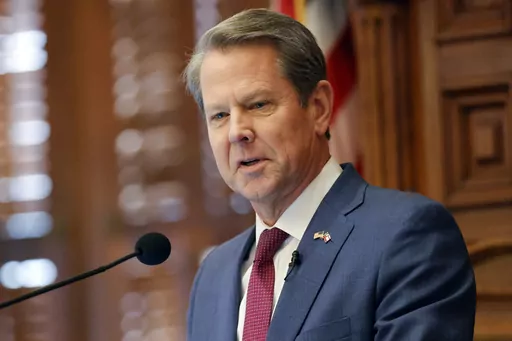 Georgia Gov. Brian Kemp delivers the State of the State address on the House floor of the state Capitol on Jan. 25, 2023 in Atlanta. The Republican Kemp signed a law on Friday, May 5, creating a commission that can discipline and remove elected prosecutors, saying the measure will curb “far-left prosecutors” who are “making our communities less safe.” (AP Photo/Alex Slitz, File)