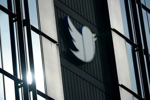 A Twitter logo hangs outside the company's offices in San Francisco, on Dec. 19, 2022. Twitter experienced a bevy of glitches Monday, March 6, 2023 as links stopped working, some users were unable to log in and images were not loading for others. (AP Photo/Jeff Chiu, File)
