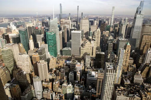 The Manhattan skyline is seen from the observatory of the Empire State Building in New York City on Wednesday, Jan. 12, 2022. Using recent metro-area data from the U.S. Census Bureau and state-level data from the Federation of State Tax Administrators, NerdWallet’s list of the 10 best cities for freelancers includes places where housing and income taxes tended to be relatively more affordable, freelancer culture was vibrant and there were signs of growing demand for goods and services.  (AP Ph