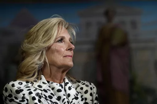 First lady Jill Biden waits to speak at the Library of Congress in Washington, Wednesday, April 19, 2023, during a reception with congressional members and spouses showcasing bipartisan support for cancer prevention and early detection. (AP Photo/Susan Walsh, File)