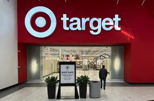 A person heads into a Target store Thursday, Jan. 11, 2024, in Lakewood, Colo. (AP Photo/David Zalubowski, File)