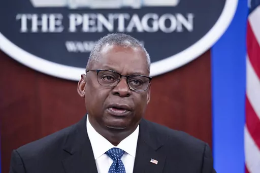 Secretary of Defense Lloyd Austin speaks at a virtual Ukraine Defense Contact Group (UDCG) meeting, Nov. 22, 2023, at the Pentagon in Washington. The secrecy surrounding Austin's hospitalizations due to prostate cancer surgery set off a political firestorm, launched multiple reviews and triggered calls for his ouster. (AP Photo/Cliff Owen, File)