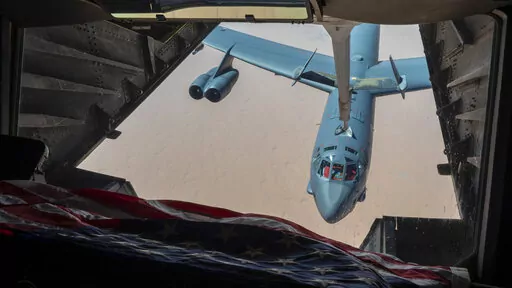 This photo released by the U.S. Air Force, shows a B-52H Stratofortress assigned to the 5th Bomb Wing, Minot Air Force Base, North Dakota, approaching a KC-10 Extender for refueling over the Middle East on Sunday, Sept. 4, 2022. The United States military said Monday it flew a pair of nuclear-capable B-52 long-distance bombers over the Middle East in a show of force, the latest such mission in the region as tensions remain high between Washington and Tehran. (Staff Sgt. Shannon Bowman/U.S. Air F