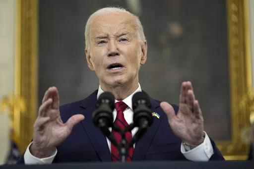 President Joe Biden speaks before signing a $95 billion Ukraine aid package that also includes support for Israel, Taiwan, and other allies, in the State Dining Room of the White House, April 24, 2024, in Washington. The Biden administration is due to deliver a first-of-its-kind formal verdict on whether Israel's conduct of its war in Gaza complies with international and U.S. laws. (AP Photo/Evan Vucci, File)