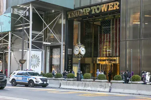 Trump Tower is visible in New York City on Feb. 20, 2022. More than three years after Manhattan prosecutors started investigating Donald Trump — after going to the Supreme Court twice to gain access to his tax records — the only criminal trial to arise from their efforts is about to begin. The Trump Organization, the holding company for Trump’s buildings, golf courses and other assets, is accused of helping some top executives avoid income taxes on compensation they got in addition to thei
