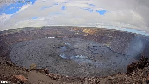 This webcam image provided by the U.S. Geological Survey shows the summit of the Kilauea volcano in Hawaii, Tuesday, June 20, 2023. An eruption of the Hawaii volcano that began nearly two weeks earlier has come to a pause, scientists said. Kilauea, one of the most active volcanoes in the world, began erupting June 7 after a three-month pause, displaying fountains of glowing red lava without threatening any communities or structures. (U.S. Geological Survey via AP)