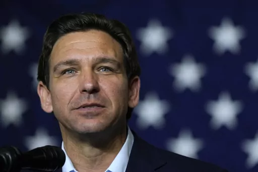 Republican presidential candidate Florida Gov. Ron DeSantis speaks during a fundraising event for U.S. Rep. Ashley Hinson, R-Iowa, Aug. 6, 2023, in Cedar Rapids, Iowa. On Friday, Aug. 11, The Associated Press reported on stories circulating online incorrectly claiming that Dominion Voting Systems owns a bank that donated $2 million to DeSantis. (AP Photo/Charlie Neibergall)