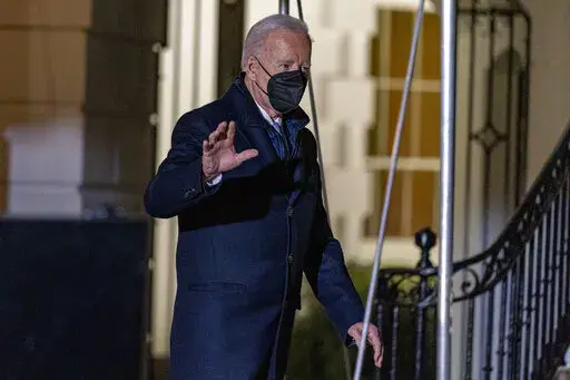 President Joe Biden walks towards Marine One on the South Lawn of the White House in Washington, Friday, Jan. 14, 2022, to travel to Wilmington, Del. (AP Photo/Andrew Harnik)