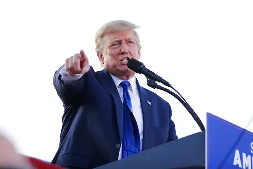 Former President Donald Trump speaks at a rally at the Delaware County Fairgrounds, Saturday, April 23, 2022, in Delaware, Ohio, to endorse Republican candidates ahead of the Ohio primary on May 3. A New York judge has found former president Donald Trump in contempt of court for failing to adequately respond to a subpoena issued by the state's attorney general as part of a civil investigation into his business dealings. (AP Photo/Joe Maiorana)