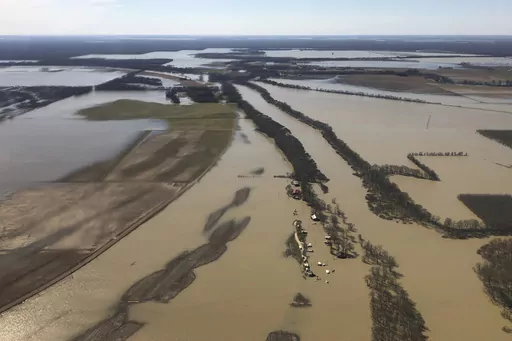 Backwater flooding covers stretches of farm land on March 17, 2019, near Yazoo City, Miss. Federal officials presented a proposal Thursday, May 4, 2023, to further control flooding in the Mississippi Delta, a move that comes after months of work from government agencies and decades of delays amid disputes over potential environmental impacts. (AP Photo/Holbrook Mohr, File)