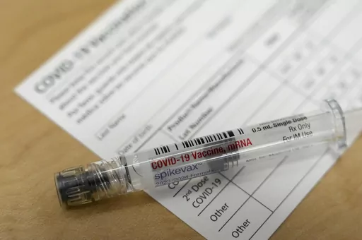 A Moderna Spikevax COVID-19 vaccine is seen at a pharmacy in Cypress, Texas on Wednesday, Sept. 20, 2023. Fall 2023 vaccination season is in full swing, with health officials in the U.S. urging both an updated COVID-19 shot and flu vaccine for most everyone. New this year are vaccines for older adults and women in late pregnancy to guard against another virus named RSV. (Melissa Phillip/Houston Chronicle via AP, File)