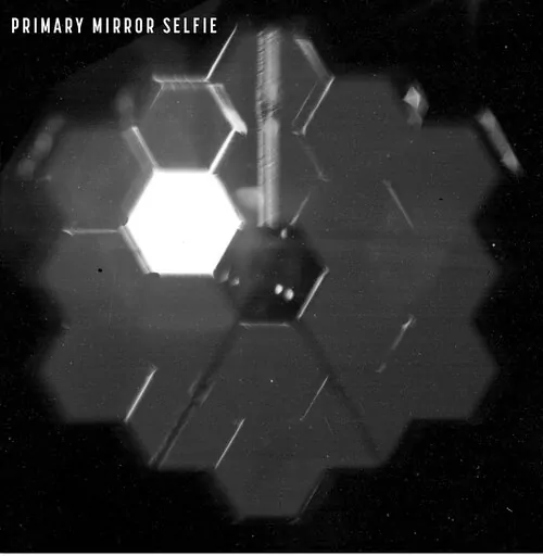 This photo provided by NASA shows a “selfie” created using a specialized pupil imaging lens inside of the NIRCam instrument that was designed to take images of the primary mirror segments instead of images of space.  (NASA via AP)