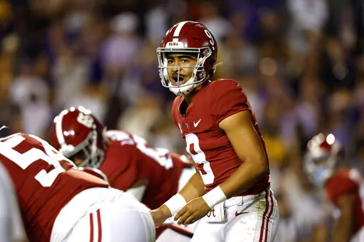 Alabama quarterback Bryce Young (9) calls a play during the first half of an NCAA college football game against LSU in Baton Rouge, La., Saturday, Nov. 5, 2022. (AP Photo/Tyler Kaufman)