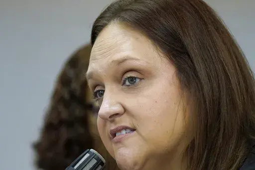 Greta Kemp Martin speaks Aug. 31, 2023, at a news conference in Jackson, Miss. Martin is the litigation director for Disability Rights Mississippi, and she said Monday, July 1, 2024, that an updated state law will remove most restrictions on who can provide help on absentee voting by people who have a disability or who are unable to read or write. (AP Photo/Rogelio V. Solis, File)