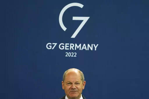 German Chancellor Olaf Scholz attends the presentation of a special stamp of the German mail service Deutsche Post for the upcoming G7 summit, at the chancellery in Berlin, Germany, Wednesday, June 15, 2022. Three back-to-back summits over the next week will test Western resolve to support Ukraine and the extent of international unity as rising geopolitical tensions and economic pain cast an increasingly long shadow. (AP Photo/Markus Schreiber, File)