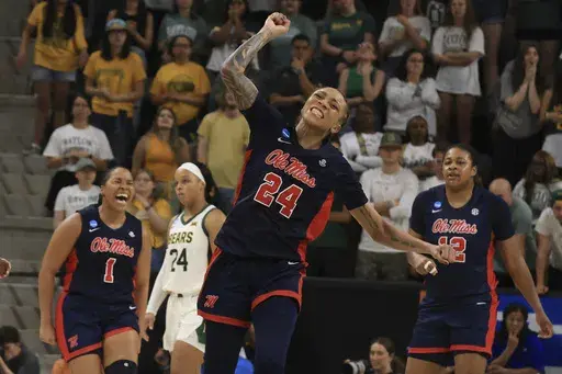 Mississippi guard Madison Scott reacts after scoring against Baylor during the second half in the second round of the NCAA college basketball tournament, Sunday, March 23, 2025, in Waco, Texas. (AP Photo/Jerry Larson)