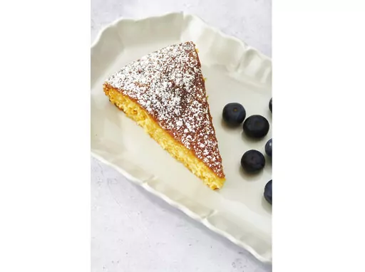 This May 2022 photo shows a recipe for orange cake. The zest and the juice are the two main ways to incorporate citrus into your cooking. (Cheyenne Cohen via AP)