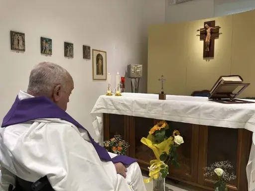 In this picture released by the Vatican Press Hall Pope Francis celebrates a mass inside the chapel of the Agostino Gemelli polyclinic in Rome, Sunday, March 16, 2025. (Vatican Press Hall, Via AP )