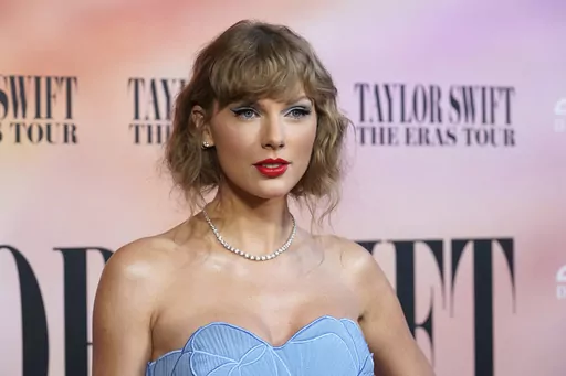 Taylor Swift arrives at the world premiere of the concert film "Taylor Swift: The Eras Tour" in Los Angeles on Oct. 11, 2023. Swift’s Instagram message encouraging her 283 million followers to register to vote was nominated for a Webby in the best creator or influencer category. (AP Photo/Chris Pizzello, File)