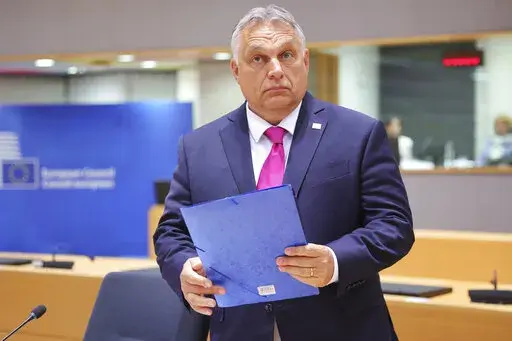 Hungarian Prime Minister Viktor Orban arrives for the an extraordinary meeting of EU leaders to discuss Ukraine, energy and food security in Brussels, Monday, May 30, 2022. European Union leaders will gather Monday in a fresh show of solidarity with Ukraine but divisions over whether to target Russian oil in a new series of sanctions are exposing the limits of how far the bloc can go to help the war-torn country. (AP Photo/Olivier Matthys)