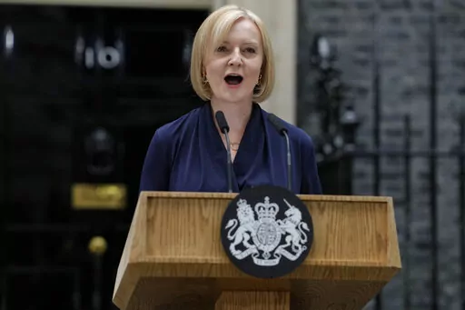 New British Prime Minister Liz Truss makes an address outside Downing Street in London Tuesday, Sept. 6, 2022 after returning from Balmoral in Scotland where she was formally appointed by Britain's Queen Elizabeth II. Truss says her government will cap domestic energy prices for homes and businesses to ease the cost-of-living crisis. Truss told lawmakers Thursday, Sept. 8, 2022 that the two-year “energy price guarantee” means average household bills will be no more than 2,500 pounds ($2,872)