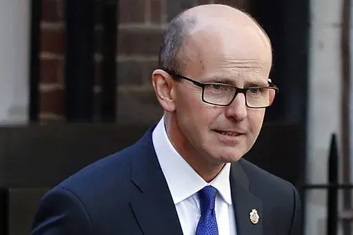 Jeremy Fleming, head of the British Government Communications Headquarters (GCHQ), is photographed in London, Thursday, Feb. 14, 2019. In a rare public speech Tuesday, Oct. 11, 2022 to the Royal United Services Institute think tank, Fleming accused China of using its economic and technological clout to clamp down at home and exert control abroad, saying Beijing’s aggressive stance is driven by fear and poses “a huge threat to us all.” (AP Photo/Frank Augstein, File)