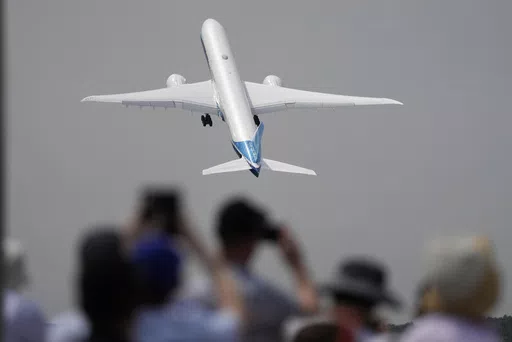 A Boeing 777X plane takes off at the Farnborough Air Show fair in Farnborough, England, on July 18, 2022. The cost of your next flight is likely to go up. That's the word from the International Air Transport Association, which held its annual meeting Monday June 3, 2024 in Dubai, home to the long-haul carrier Emirates. (AP Photo/Frank Augstein, File)