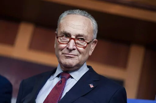 FILE -Senate Majority Leader Chuck Schumer, D-N.Y., speaks to reporters after a closed-door policy meeting, at the Capitol in Washington, Tuesday, Aug. 2, 2022.  Schumer effectively became the leader of the U.S. Senate on the morning of the Jan. 6, 2021 Capitol insurrection. And it has been mess and tumultuous ever since. Yet the New York Democrat has led the Senate in a surprisingly productive run, despite the longest evenly split 50-50 Senate in U.S. history. (AP Photo/J. Scott Applewhite, Fil