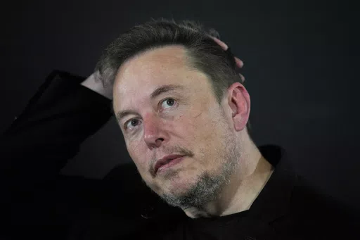 Elon Musk appears at an event in London, on Nov. 2, 2023. A crusading Brazilian Supreme Court justice included Musk as a target in an ongoing investigation over the dissemination of fake news and opened a separate investigation late Sunday, April 7, 2024, into the executive for alleged obstruction. (AP Photo/Kirsty Wigglesworth, Pool, File)
